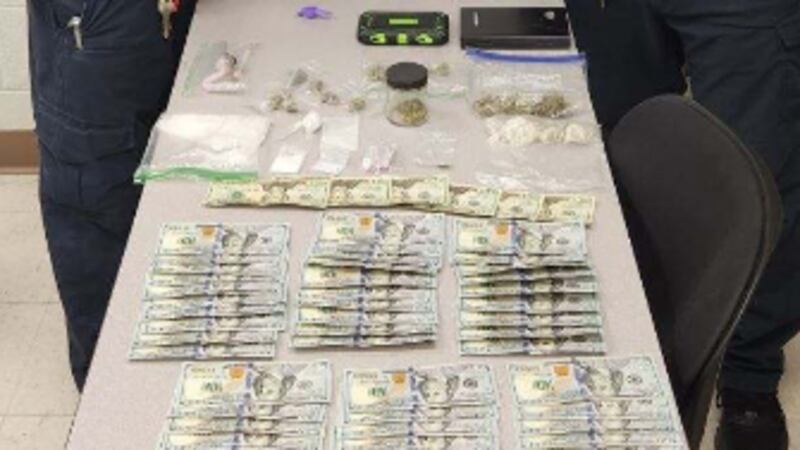 Officers M.T. Lineberry and R.S. Ortiz with seized items