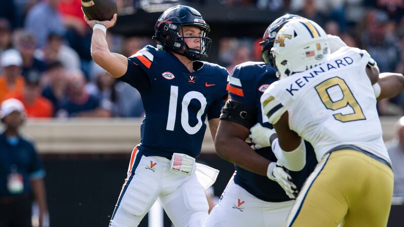 Virginia quarterback Anthony Colandrea (10) throws a pass as Georgia Tech defensive lineman...