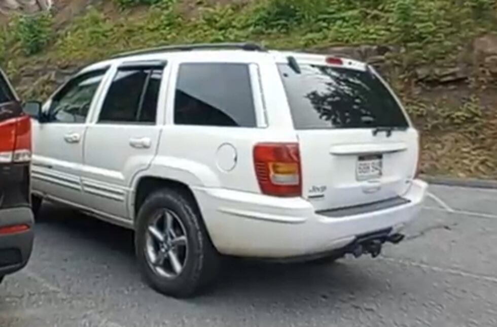Suspect's white Jeep Grand Cherokee