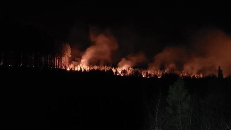Brush fire along Old Firetrail Road in Huddleston