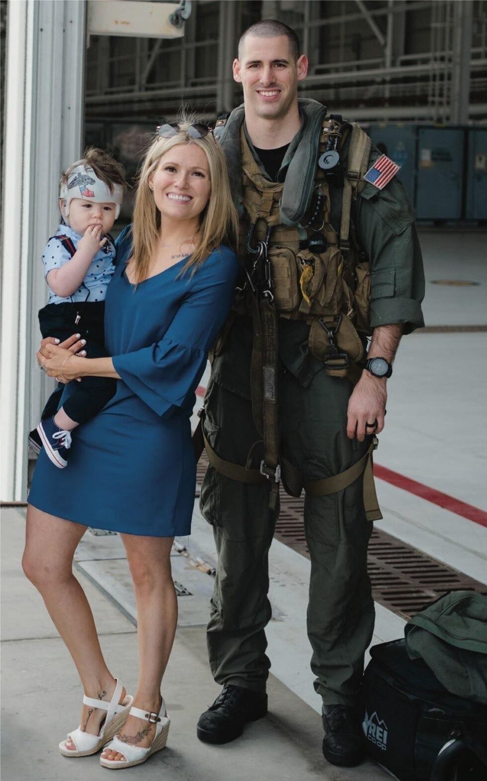 Naval Air Crewman (Helicopter) 2nd Class James P. Buriak, 31, from Salem, VA, with wife Megan,...