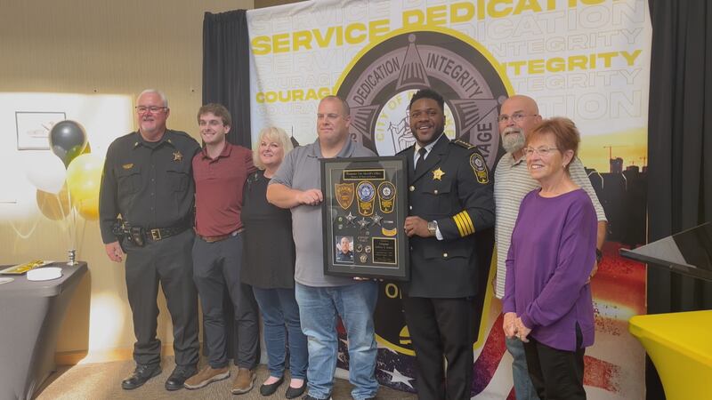 Dozens gathered to celebrate promotions and retirements